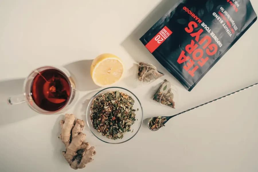 Tea For Guys loose leaf blend with lemon, ginger and a cup of tea